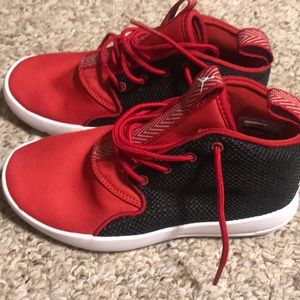 Red and Black Air Jordan. Never worn. Kids size 12